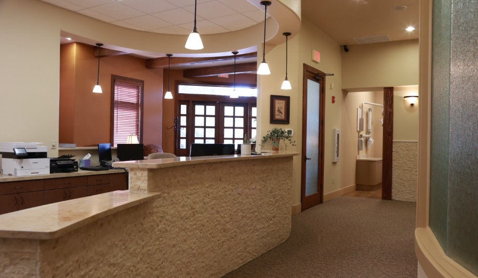 Hallway leading into dental office treatment area
